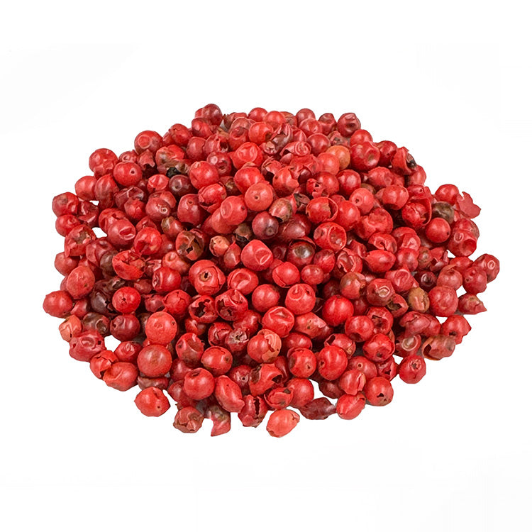 Ein kleiner Haufen Bio Pfeffer rosa ganz. Der Bio-Pfeffer hat eine dunkelrote Farbe. Es sieht sehr lecker aus.